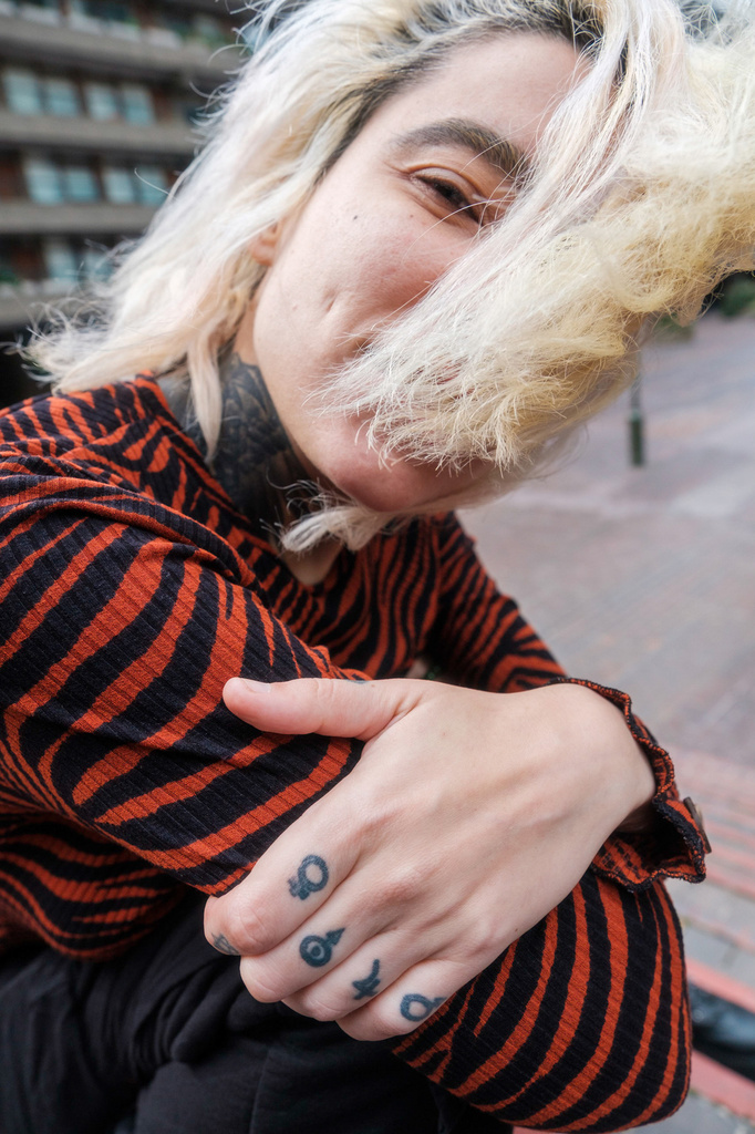 Half the face covered by hair